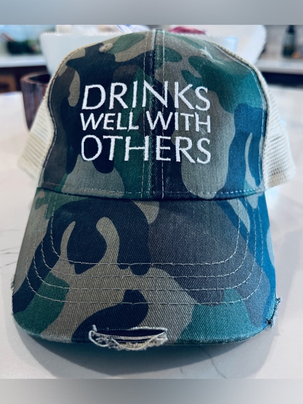 Distressed Camouflage Baseball Hat "Drinks Well With Others"